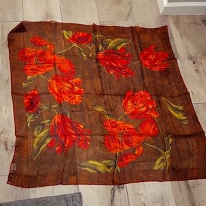 Carlisle Sheer Silk Scarf. Brown background with beautiful orange tulips.